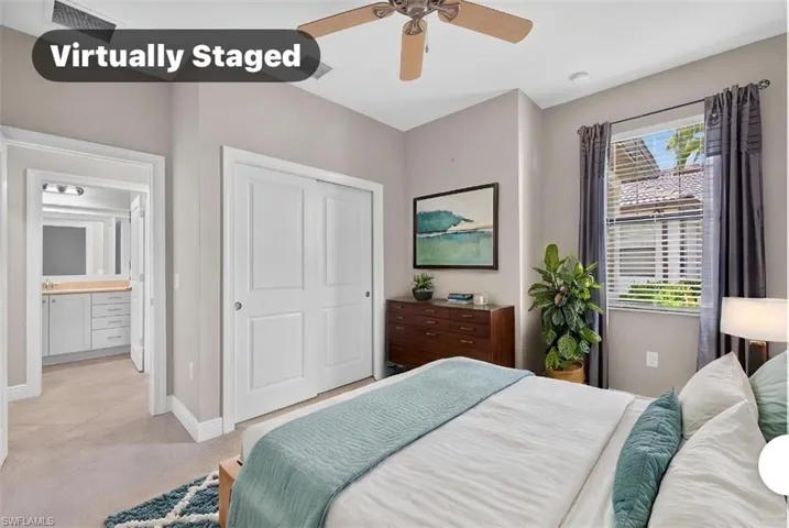 Bedroom featuring neutral wall colors, a ceiling fan, a window with blinds, drapes and a closet