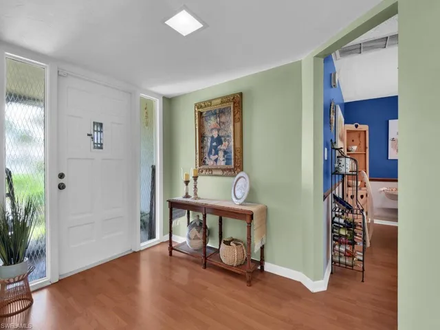 Entryway featuring wood-type flooring