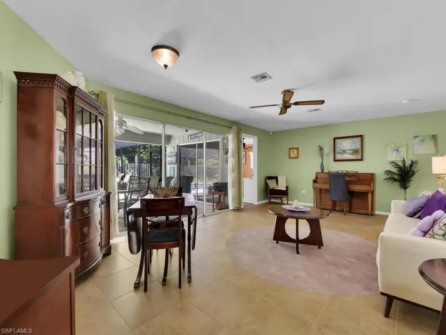 Tiled living room with ceiling fan