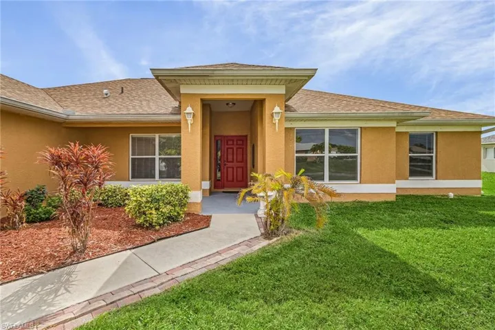 View of front of house with a front lawn