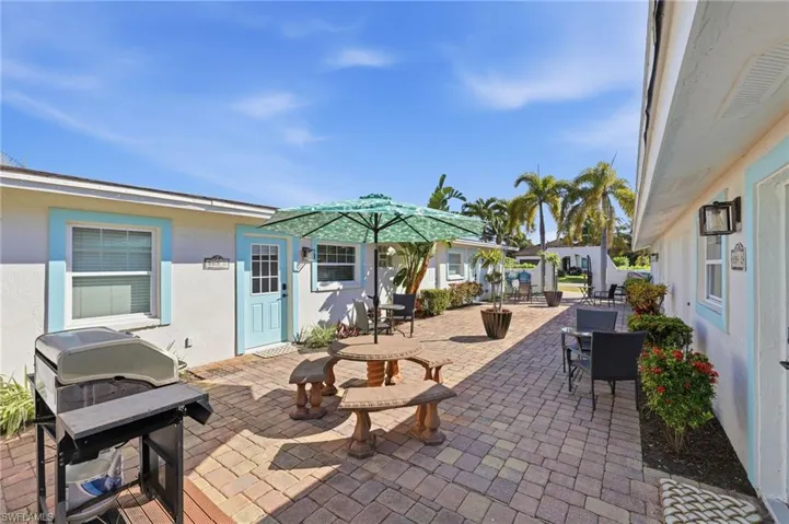 View of patio / terrace with grilling area and outdoor dining area