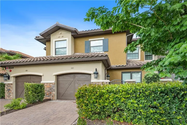 Mediterranean / spanish-style house with a garage