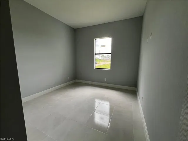 View of tiled spare room