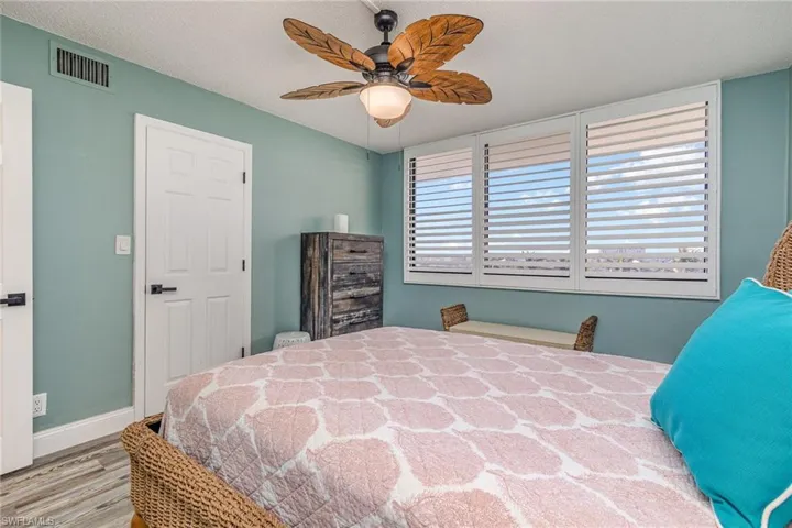 GUEST BEDROOM SHOWING ENTRANCE TO WALK-IN CLOSET