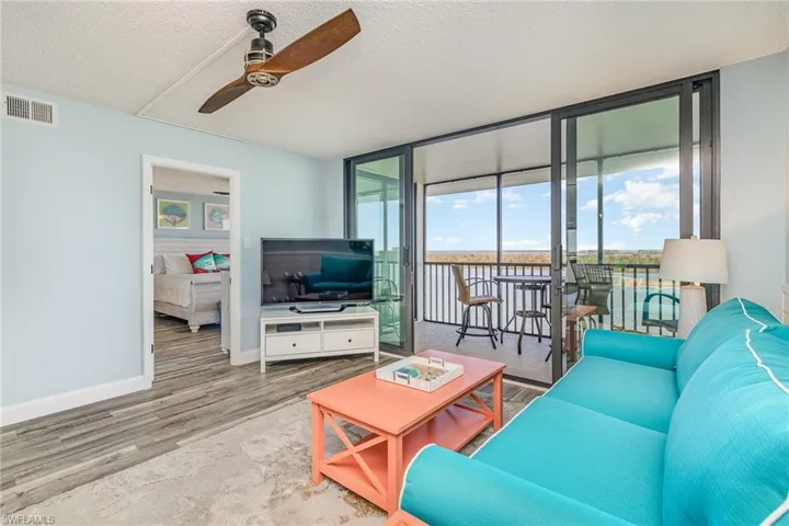 LIVING AREA VIEW SHOWING ENTRANCE TO OWNER'S SUITE