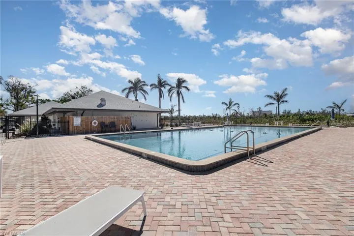 COMMUNITY POOL.  BUILDINGS CONTAIN FITNESS ROOM AND SOCIAL ROOM.  POOL IS 7' DEEP!