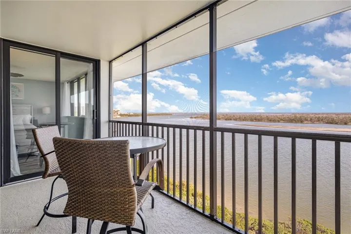 ESTERO BAY VIEWS.  ENTRANCE TO OWNER'S SUITE SHOWN AT LEFT.