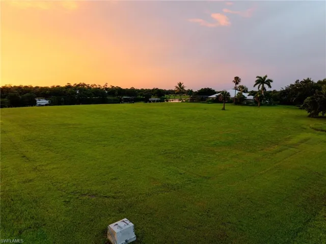 View of yard at dusk