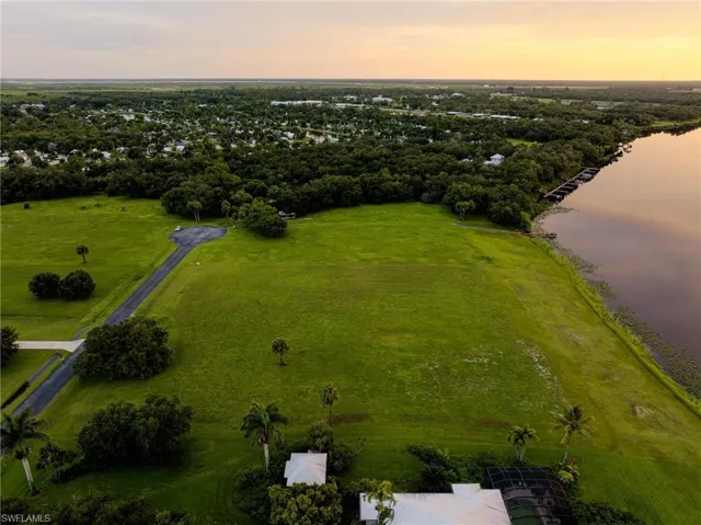 Aerial view at dusk with a water view