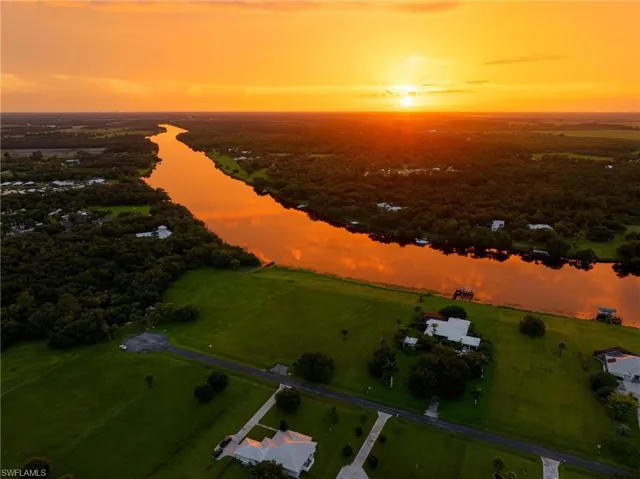 Aerial view at dusk with a water view