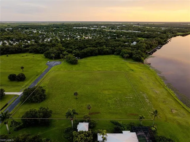 Aerial view at dusk with a water view