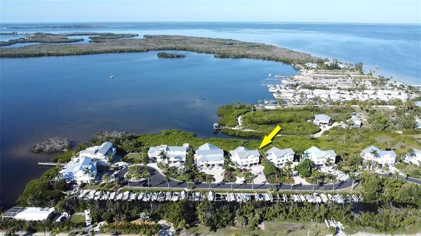 View of the bay with boat slip across the street