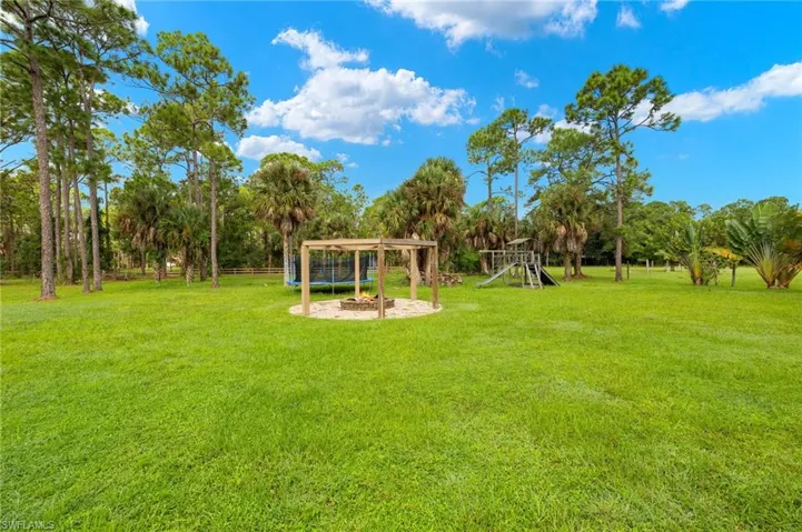 View of yard with a playground