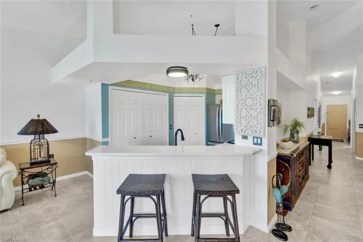 Bar-height counter perfect for casual dining or entertaining guests.