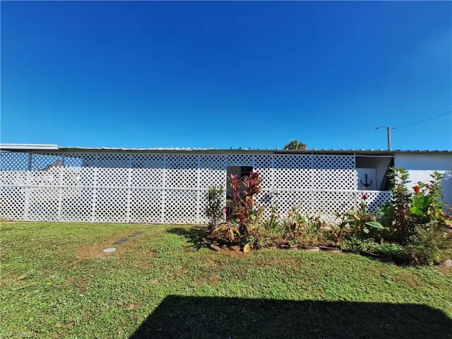 West Side with driveway