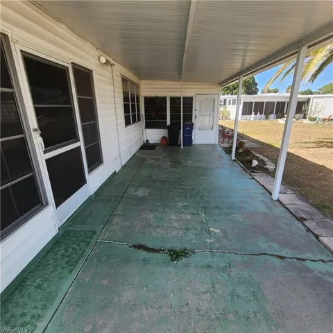Looking Into Carport & Side Porch