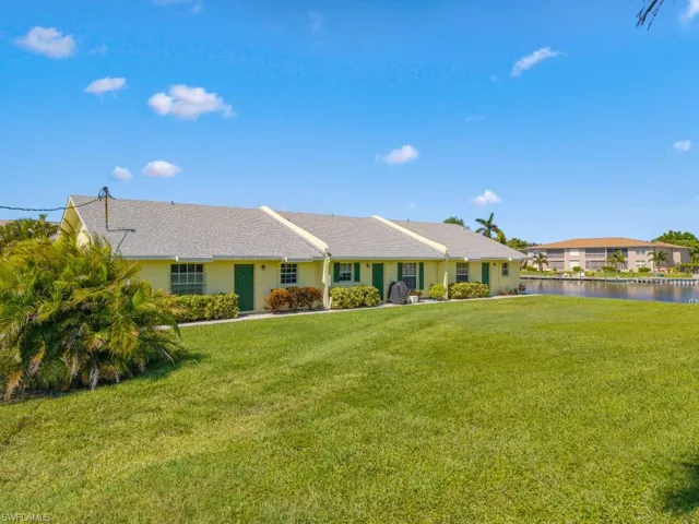 View of front of property with a front lawn