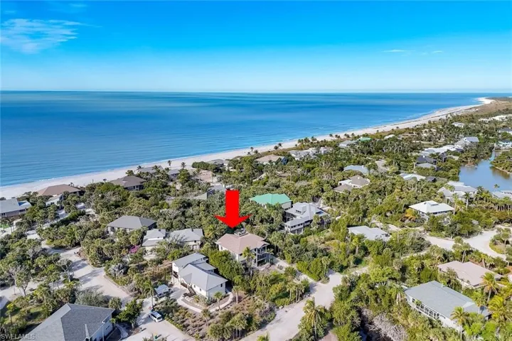 Aerial view of property's location near beach