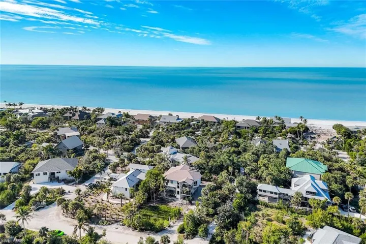 Aerial view of residential area and Gulf beach