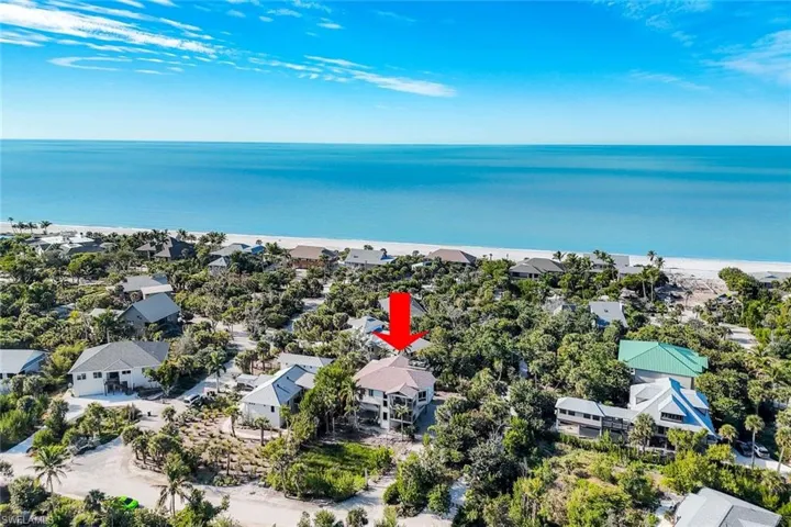 Aerial view of property's location with expansive coastline