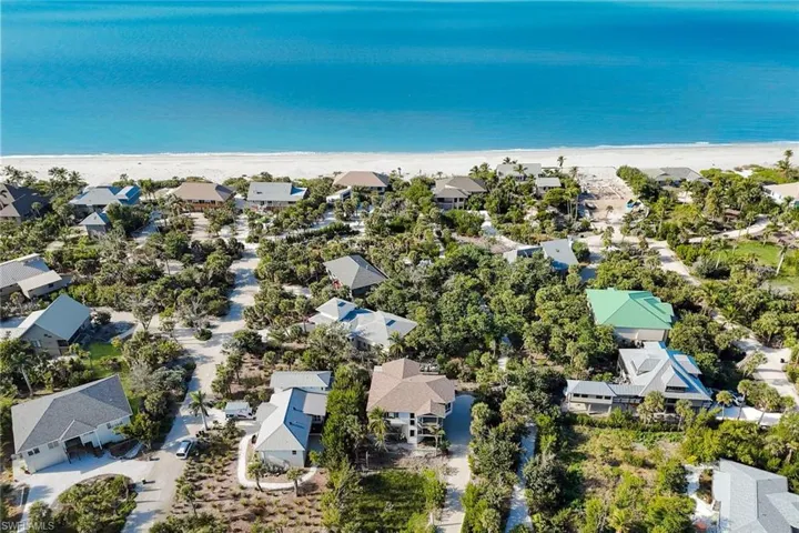 Aerial view of residential area with extended coastline