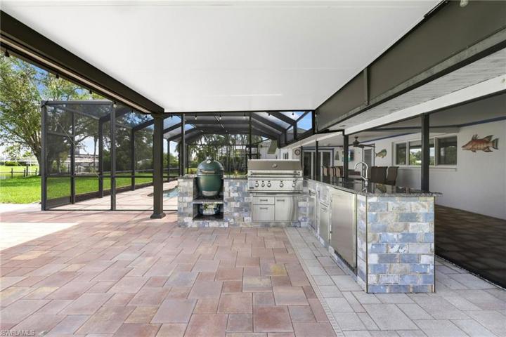 Outdoor Stainless Steel Kitchen with Covered  roof with Pavers