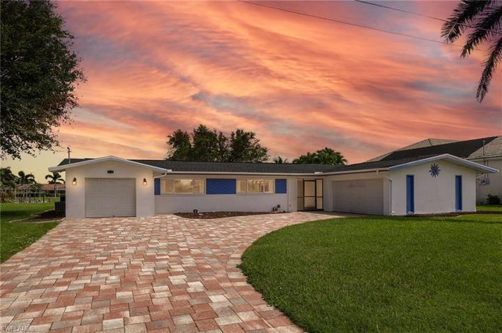 This waterfront pool home features a triple lot with a bonus garage/storage/workshop, etc. on a quiet cul-de-sac off the city main attractions!  City of Cape Coral