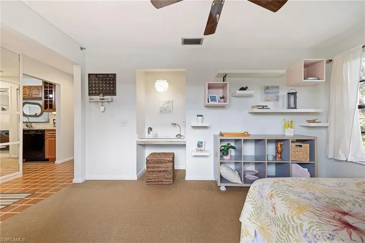 Bedroom with carpet floors and ceiling fan