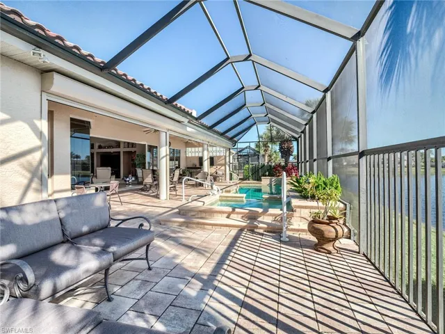 Note the roll-down shutter boxes to protect the large lanai and all furnishings inside