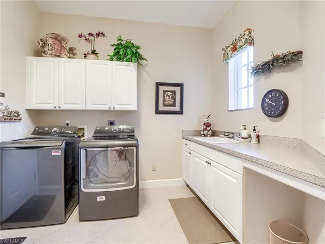 Large laundry room between kitchen and garage.  Newer W/D