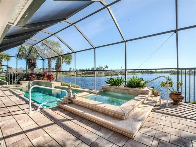 Pool and spa with a direct lake view