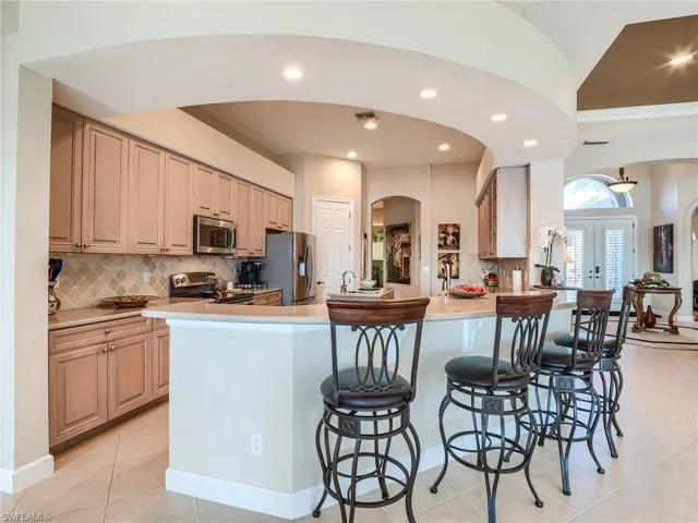 Open kitchen with entertainment bar area