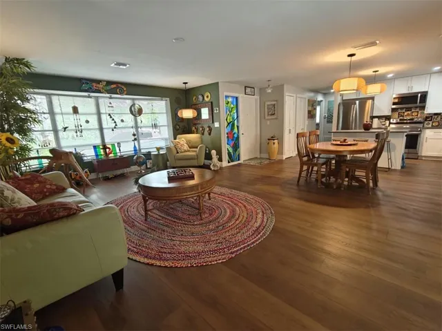 Living room featuring dark hardwood / wood-style floors