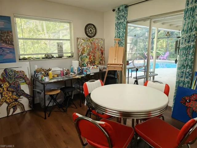 Dining area featuring hardwood / wood-style floors