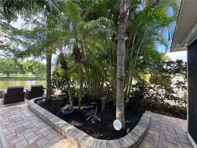 View of patio / terrace with a water view