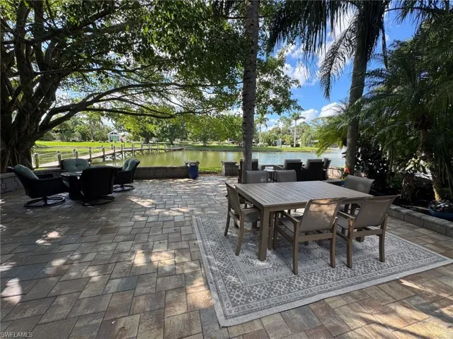View of patio / terrace with a water view