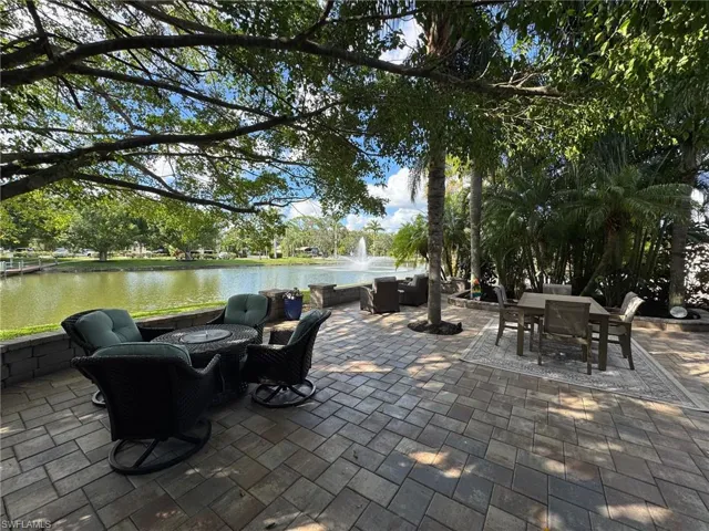 View of patio / terrace featuring a water view