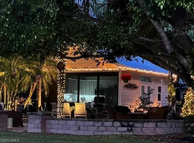 Back of property featuring a patio area