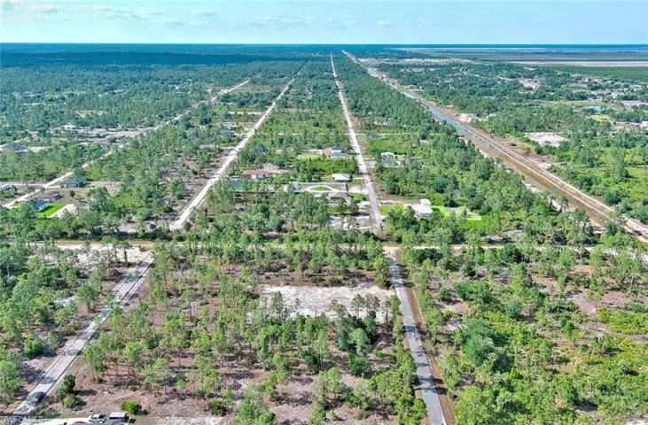 Aerial view of property and surrounding area