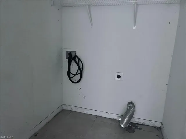 Washroom featuring washer hookup and hookup for an electric dryer