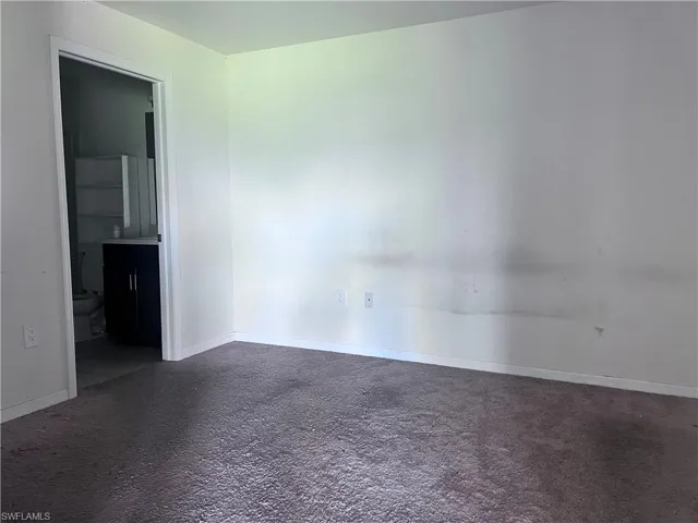 View of carpeted spare room
