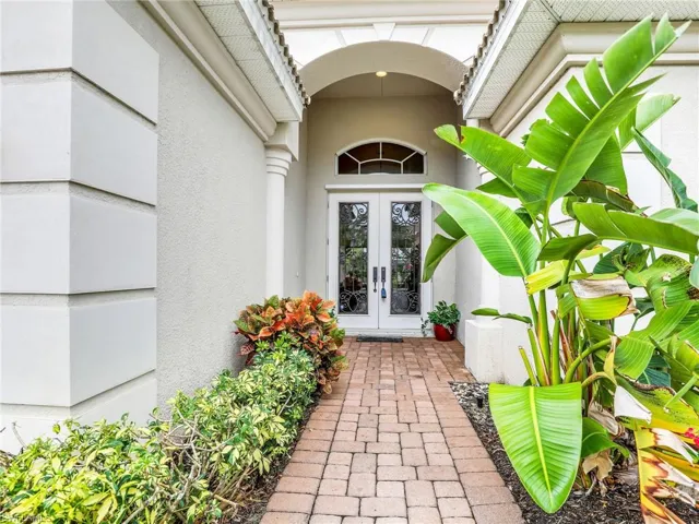 Entrance to property featuring french doors