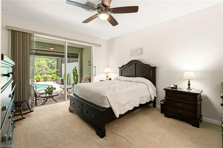 TWO HUGE ENTERTAINMENT AREAS WITH SETS OF DOUBLE & TRIPLE SLIDING GLASS DOORS!