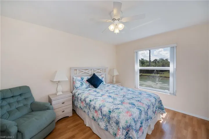 Bedroom featuring light wood-style flooring and a ceiling fan