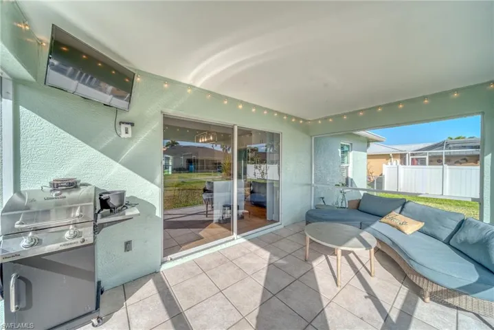 View of patio with area for grilling