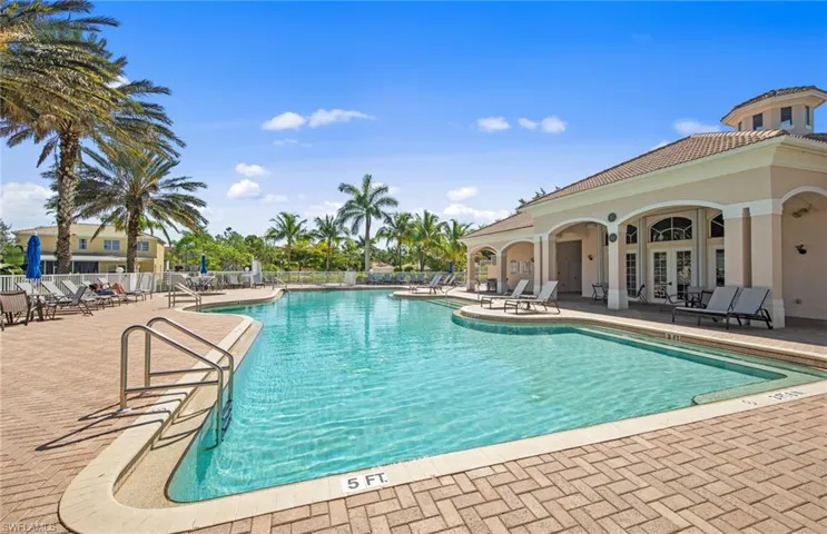 Community pool featuring a patio area