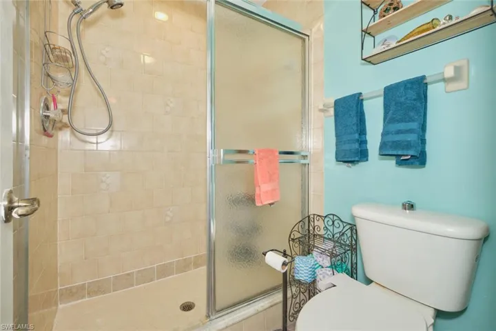 Bathroom with toilet and a shower stall