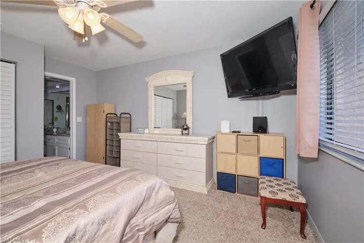 Bedroom featuring carpet floors and a ceiling fan