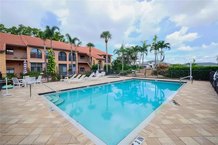 Community pool featuring a patio area