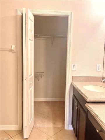 Walk In Closet Adjoins The Bathroom